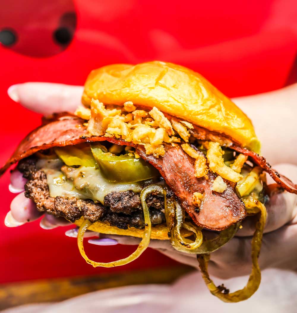 Bacon cheeseburger from affordable burger menu Boss Bites