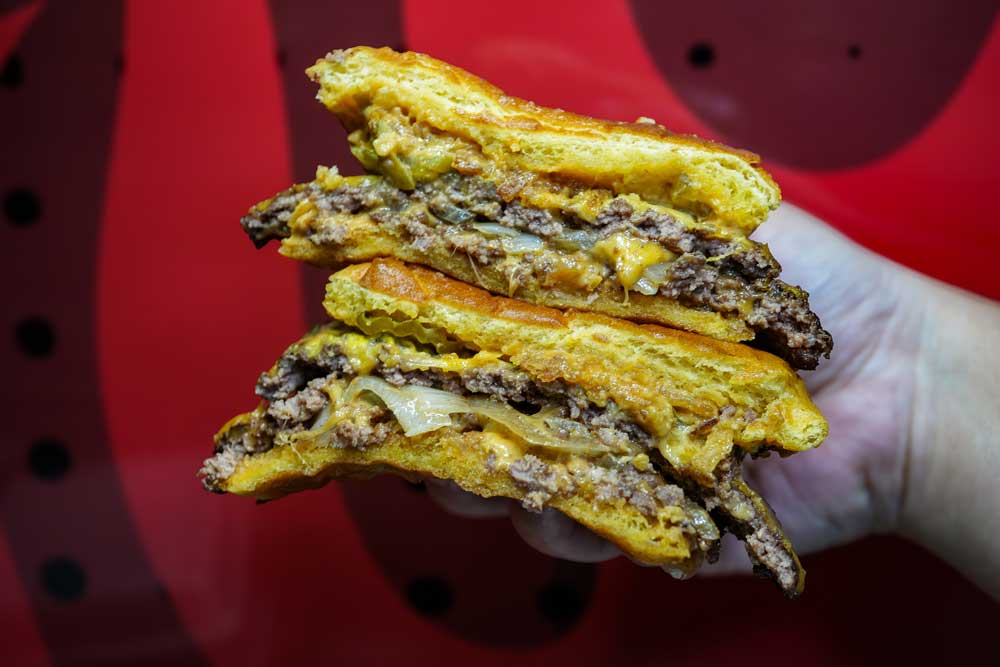 Stacked juicy burgers from BossBites Sugar Land TX