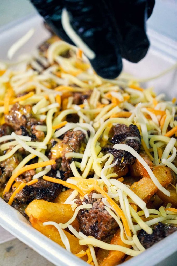 Close-up of Boss Bites signature loaded fries dish