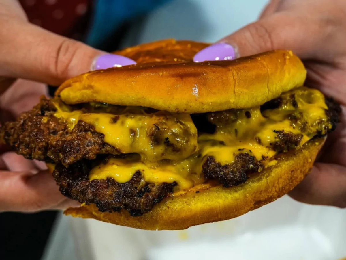 Delicious double cheeseburger with melted cheese at one of the best Sugar Grove burger spots